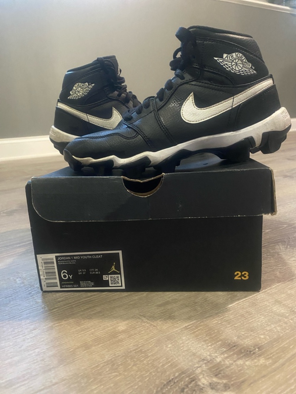Jordan Kids Black and White High-Top Sneakers